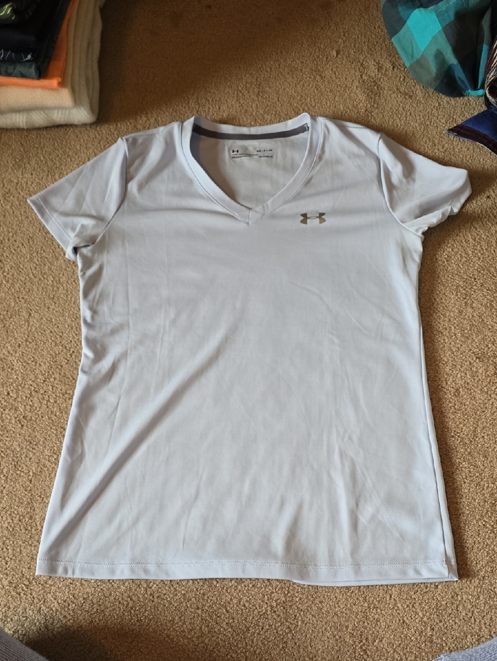 Under Armour Women’s Light Blue V-Neck Performance Tee with Silver Logo